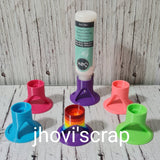 Soporte para pegante tricolor